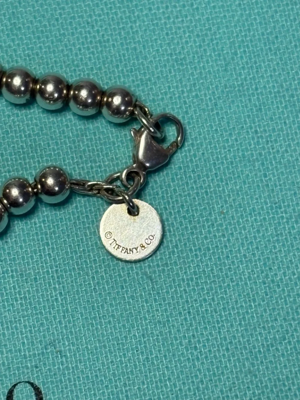 Authentic Tiffany & Co. 4mm Bead Bracelet with Mini Blue Heart Charm - Picture 3 of 6